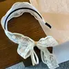 Diadema de malla con lazo de encaje de estilo francés de ala ancha para mujer, tocado de cinta simple de estilo pastoral con un toque de alta gama
