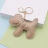 Ventas Directas de Fábrica Transfronterizo Colgante de Bolso de Cachorro de Dibujos Animados Moda Creativa Llavero de Cachorro de Cuero de PU Colgante para Coche