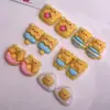 Desenho Animado Estilo Japonês Brilhante Urso Manteiga Resina DIY Presilha de Cabelo Grampo de Cabelo Aplique Capa de Celular Pequeno Acessório