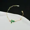 Pulsera de joyería de moda dorada ins para combinar con todo, pulsera de acero de titanio simple de lujo ligero, trébol de cuatro hojas para mujer, transfronteriza