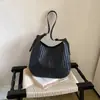 Bolso tejido elegante y moderno 2026 verano nuevo de moda bolso de mano de un solo hombro casual de gran capacidad bolso de axila