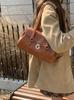 2026 Nueva Bolsa de Hombro Coreana Ins de Nicho para Otoño e Invierno con Textura Casual Retro y Sensación de Lujo Ligero, Bolso de Mano y Bolso Cruzado para Mujer