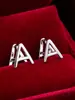 Pendientes de botón casuales de moda populares, creativos, con diseño de letra, simples, versátiles para el día a día, de alta calidad, lujo ligero