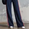 2026 Nuevo Conjunto Deportivo Casual de Dos Piezas para Mujer Estilo Tenis Europeo y Americano con Top de Tubo Rayado y Pantalones de Pierna Ancha Holgados Transfronterizo TK