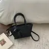 Bolso de Mano de Moda de Gama Alta 2026 Nuevo Modelo Versátil para el Trabajo Cruzado Bolso Cubo Pequeño Exquisito de Moda