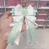 Pingente de Laço em Forma de Leque Estilo Ins com Acessórios de Floco de Neve e Pérola, Decoração Versátil para Chaveiro de Mochila DIY Feito à Mão