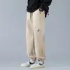 Nueva ropa ins para hombre para otoño e invierno, nuevos pantalones ligeramente anchos y fluidos que estilizan, pantalones deportivos rectos holgados para hombres de talla grande