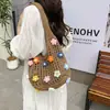 Nova Bolsa de Palha de Flor Bolsa Tote Portátil de Grande Capacidade Bolsa Tecida de Praia Versátil e Moderna Bolsa de Ombro Floral para Mulheres