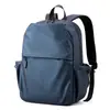 Venta al mayoreo del fabricante: Mochilas sencillas y minimalistas para hombre, con acabado similar al cuero, material impermeable, diseño ligero y un estilo moderno y a la moda, adecuadas para la escuela, los negocios y el transporte diario.