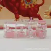 Botella de Arena Movediza con Bestia de Cuernos Dorados Rellena de Aceite, Varias Combinaciones de Conjuntos, Llavero con Forma de Botella, Colgante para Bolso, Llavero para Mochila, Moderno