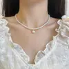 2025 Nuevo Popular Collar de Gama Alta Lujo Ligero Perla de Corazón de Agua Dulce Perla de Semilla de Mijo Collar Versátil Cadena para Suéter