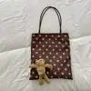 Bolso tote retro de ante con lunares para mujer, nuevo estilo 2026, bolso de hombro versátil, bolso para el día a día