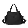 Bolsa de mão moderna para mulheres, bolsa de ombro novo estilo, material de nylon, múltiplos bolsos, grande capacidade, bolsa transversal, adequada para passeios, deslocamento e uso casual