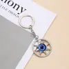 Llavero de Cruz Hip-Hop Europeo y Americano Gótico Flor Hueca de Forma Diamante de Color Acero Inoxidable Colgante de Llave Venta al por Mayor