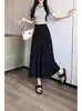 Falda midi plisada de cintura alta y caída para mujer, con un diseño blanco de estilo hada, estilo coreano, que cubre las caderas, silueta en A y dobladillo acampanado.