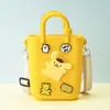 Monedero de silicona con forma de cueva cuadrada para niños, bolso cruzado para caminar, divertido y bonito bolso de silicona para cambio.