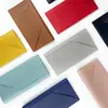 En stock tarjetero transfronterizo set de libreta de pasaporte al por mayor BOLSA DE IDENTIFICACIÓN de cuero PU con logotipo, engrosada, con estampado en caliente, almacenamiento