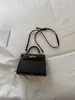 Bolso de hombro texturizado de alta calidad para mujer 2026 nuevo nicho moda bolso de mano simple bolso cruzado de gran capacidad