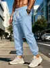Pantalones versátiles de algodón y lino para hombre, nuevos, transfronterizos europeos y americanos, cintura elástica, corte holgado, color liso, transpirables, con puño