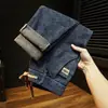 Jeans elásticos al por mayor transfronterizos, nuevos pantalones ajustados elásticos de primavera y otoño, pantalones harén casuales de moda de corte holgado