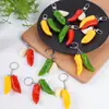 Llavero de pimiento rojo verde amarillo artificial creativo para bolsa de comida pimiento dulce ajo colgante tazón completo comida y juego al por mayor