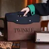 Bolsas de fieltro para el Día de la Enfermera al por mayor, bolsas de regalo empresariales personalizadas, se pueden imprimir con patrones de LOGOTIPO, bolsas de mano