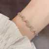 Pulsera de Zirconia con Forma de Hoja de Tirar Versátil de Lujo Ligero Francés Exquisita Moderna Sencilla Tacto de Alta Gama Super Brillante Joyería de Mano al por Mayor