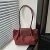 Bolso de mujer para ir al trabajo 2026 nueva moda de otoño simple de gamuza para hombro o axila bolso tipo cubo de gran capacidad para mujeres