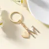 Nuevo Llavero con Forma de Corazón Transfronterizo de Comercio Exterior con Iniciales en Inglés, Lujo Ligero, Unisex, Moderno y Versátil