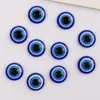 Venta al por mayor de fábrica resina ojo azul oblea Ojo Turco del Diablo ojo azul cuenta plana azul accesorios para ropa