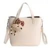 Bolso Cubo de Mano Estilo Coreano de Nicho para Mujer 2026 Modelo Nuevo de Primavera Bolso Cruzado de Hombro Casual Elegante de Alta Calidad