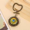 Llavero Creativo Personalizado Accesorios Colgante Gema del Tiempo Doble Cara DIY Joyería Decorativa Colgante de Aleación Venta al por Mayor