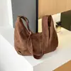 Bolso de mano de gran capacidad modelo nuevo 2026 transfronterizo, diseño de nicho vintage de gamuza, bolso cruzado versátil tipo dumpling