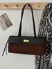 Bolsos transfronterizos 2026 nuevo moda vintage nicho casual bolso de hombro alta estética simple bolso de axila