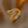 Anillo de forma de uña espiral con incrustaciones de circonita, anillo de lujo ligero de alta calidad, anillo exquisito popular en internet, fabricantes, joyería en stock, venta al por mayor