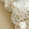 Juego de ropa de cama de cuatro piezas de algodón puro con estampado floral pastoral funda de edredón sábana para cama temporada universal todo algodón estilo fresco estilo sábana bajera