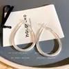 Pendientes de Metal Esmerilado de Forma de Gota de Gama Alta Estilo Coreano Estilo Ins Europeo y Americano Versátiles para Ropa de Trabajo Pendientes Elegantes Pendientes de Moda