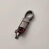 Directo de fábrica llavero de cuerda tejida accesorios de ferretería hebilla de herradura colgante para llave de coche accesorios de coche de moda