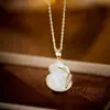 Nuevo estilo chino aretes collar de calabaza de nácar natural traje nicho alta gama moda cadena clavícula aretes mujer