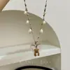 Collar de Perlas con Oso Flocado Lindo Nuevo Retro Coreano Diseño de Nicho Infantil Versátil de Alta Gama para Mujeres
