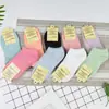 Calcetines de mujer calcetines tipo barco calcetines para estudiantes calcetines de moda para mujer color liso tobilleros calcetines invisibles suministro de puesto calcetines al por mayor