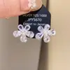 Pendientes de plata con diseño geométrico incrustado de diamantes, únicos, exquisitos, a la moda, de lujo ligero, pendientes de alta gama con un diseño de nicho