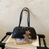 Bolso Nuevo de Mujer Otoño 2026 Alta Apariencia Bolso de Mano Versátil para Viajes de Negocios Capacidad Media Cremallera Bolso de Hombro Único Cruzado