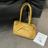 Bolso tote tejido de color liso y corte relajado, nuevo modelo de verano 2026, bolso de hombro y axila de gran capacidad de alto valor de nicho