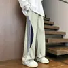 Pantalones retro americanos para hombre, pantalones de retazos a rayas de moda para primavera y otoño, pantalones deportivos casuales holgados de alta costura, a la moda