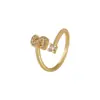 Distrito Lu Temu Más Vendido 26 Letras Inglesas Microincrustado Circonita Moda Anillo para Mujer Chapado en Cobre con 18K Anillo Abierto