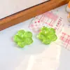 Flor de frangipani resinada transparente com glitter para fivela de sapato DIY, acessório de decoração de sapato para tamancos, presilhas de cabelo, brincos e capas de celular
