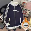Chaqueta de color block a rayas con cuello alto estilo americano para hombre, chaqueta deportiva de retazos de marca de moda para otoño e invierno, sudadera tipo cárdigan de alta gama para parejas