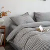 Juego de cuatro piezas de algodón puro a rayas estilo japonés, juego de sábanas y fundas de edredón 100% algodón modelo nuevo 2026, juego de tres piezas para ropa de cama de dormitorio estudiantil