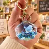 Colgante de Bolsita de Arena Movediza Oceánica Rellena de Aceite Llavero de Concha Animales de Dibujos Animados Delfín Pingüino Llavero de Muñeco Regalo